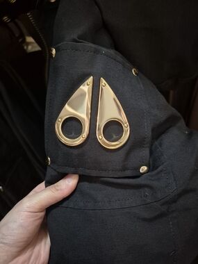 Moose Knuckles Black Jacket with Gold Lining and Embroidered Crest
